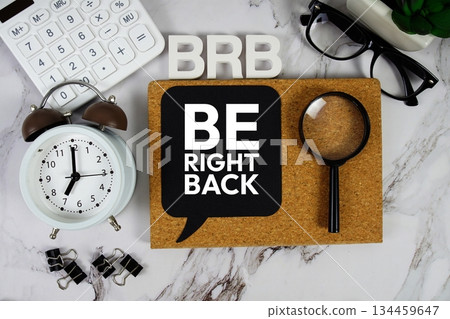 BRB Be Right Back acronym with calculator, alarm clock and magnifying glass, Business concept BRB Be Right Back acronym with calculator, alarm clock and magnifying glass, Business concept 134459647