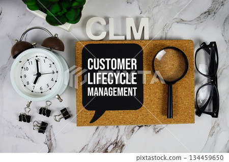 CLM - Customer Lifecycle Management acronym with alarm clock and magnifying glass, business concept background 134459650