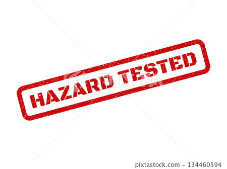 Grunge textured red stamp with HAZARD TESTED text for certified safety product labeling Grunge textured red stamp with HAZARD TESTED text for certified safety product labeling 134460594