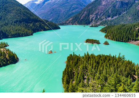 Landscape of mountain peak and Diablo lake. Nature landscape. Diablo Lake in North Cascades National Park. Scenic nature view at Diablo lake. Diablo lake with mountain landscape. Wanderlust Landscape of mountain peak and Diablo lake. Nature landscape. Diablo Lake in North Cascades National Park. Scenic nature view at Diablo lake. Diablo lake with mountain landscape. Wanderlust 134460655