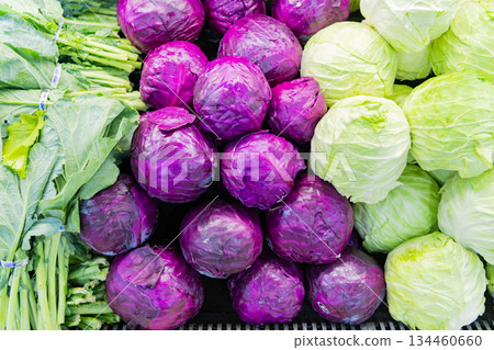 Organic food. Harvesting and farming. Organic vegetable red cabbage and greengrocery. Background of organic cabbage. Eco vegetable. Red cabbage background. Green grocery vegetable in food market Organic food. Harvesting and farming. Organic vegetable red cabbage and greengrocery. Background of organic cabbage. Eco vegetable. Red cabbage background. Green grocery vegetable in food market 134460660