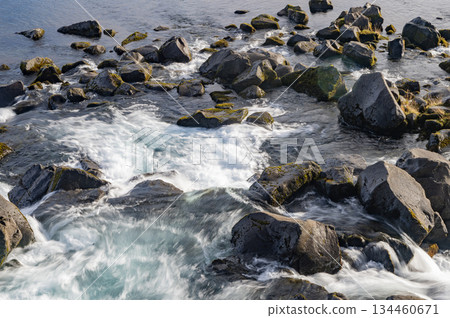 River flow in nature. Natural stream of river rock. Water of river flow in wilderness. Wilderness nature brook. Stream of creek water. Nature wildness. River creek cascade. Rapid stream River flow in nature. Natural stream of river rock. Water of river flow in wilderness. Wilderness nature brook. Stream of creek water. Nature wildness. River creek cascade. Rapid stream 134460671