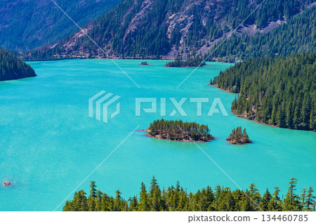 Diablo lake with mountain landscape. Landscape of mountain peak and Diablo lake. Nature landscape. Diablo Lake in North Cascades National Park. Scenic nature view at Diablo lake 134460785