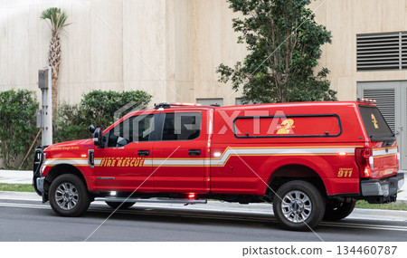 Miami, Florida, USA - December 01, 2024: City of Miami fire rescue red firetruck. 911 emergency. Firetruck outdoor. Firetruck vehicle, side view 134460787