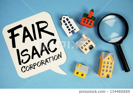 FICO Fair Isaac Corporation text with house models on blue background FICO Fair Isaac Corporation text with house models on blue background 134460889