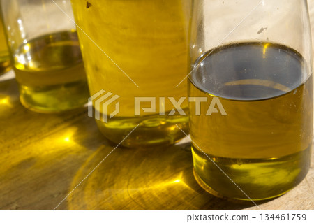 golden olive oil reflections 134461759