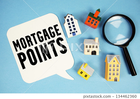 Mortgage Points text with house models on blue background Mortgage Points text with house models on blue background 134462360