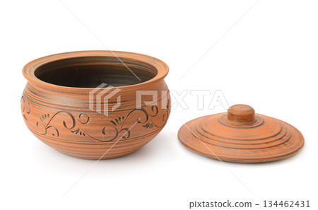 Handmade ceramic pot and matching lid displayed on clean white surface Handmade ceramic pot and matching lid displayed on clean white surface 134462431