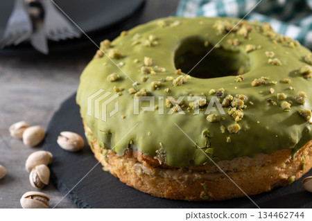 Pistacio cake on wooden table Pistacio cake on wooden table 134462744