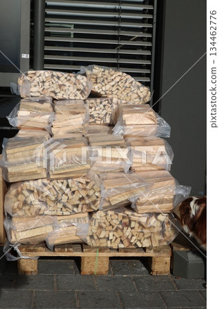 Pallet of packaged firewood ready for sale Pallet of packaged firewood ready for sale 134462776