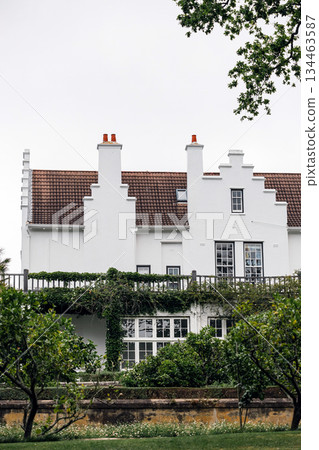 Large white estate house with a terracotta roof, private residential property 134463587