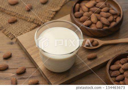 Almond milk and almond nuts 134463673