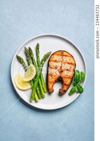 Grilled salmon steak with asparagus Grilled salmon steak with asparagus 134463732