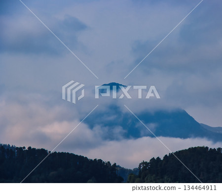 Mountain Partially Covered by Clouds Mountain Partially Covered by Clouds 134464911
