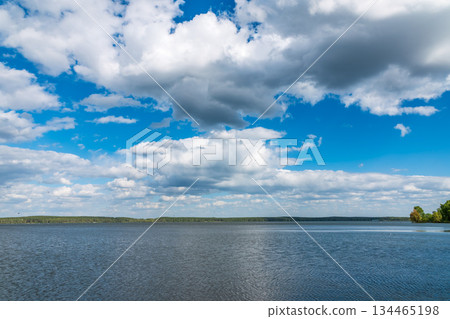 Blue lake with cloudy sky, natural background Blue lake with cloudy sky, natural background 134465198