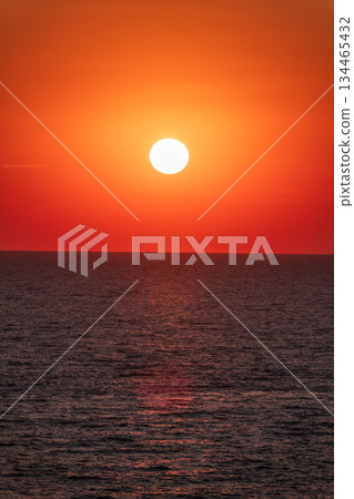 Beautiful red and orange sunrise over the sea. Beautiful red and orange sunrise over the sea. 134465432
