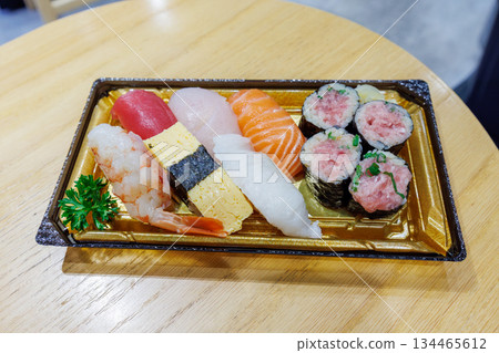 Takeaway sushi box on a table 134465612