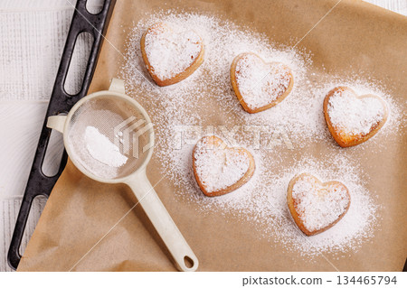 Delightful homemade heart-shaped cookies, perfectly crafted for Valentines Day Delightful homemade heart-shaped cookies, perfectly crafted for Valentines Day 134465794