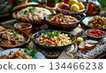 Celebratory spread of Estonian national cuisine for an Independence Day feast. Festive table setting with rustic charm, emphasizing tradition, family, and national identity 134466238