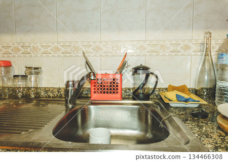 Sink with dishes Sink with dishes 134466308