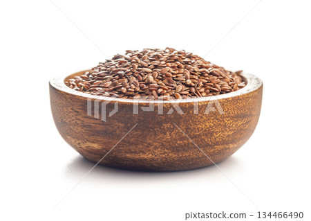 Linseed or flaxseed. Healthy flax seed in bowl isolated on white background. 134466490