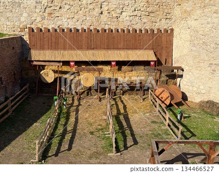 Top view of medieval shooting range. Historical entertainment, craftsmanship and heritage preservation. Top view of medieval shooting range. Historical entertainment, craftsmanship and heritage preservation. 134466527