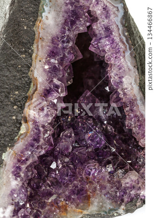 Amethyst Crystal Druse macro mineral on white background Amethyst Crystal Druse macro mineral on white background 134466867