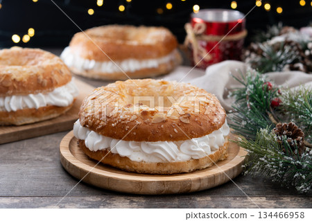 Traditional Spanish Roscon de Reyes with christmas decoration Traditional Spanish Roscon de Reyes with christmas decoration 134466958