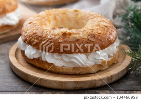 Traditional Spanish Roscon de Reyes with christmas decoration Traditional Spanish Roscon de Reyes with christmas decoration 134466959
