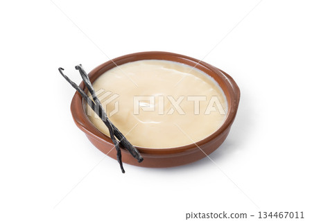 Creamy homemade Spanish custard served in a bowl with cinnamon Creamy homemade Spanish custard served in a bowl with cinnamon 134467011