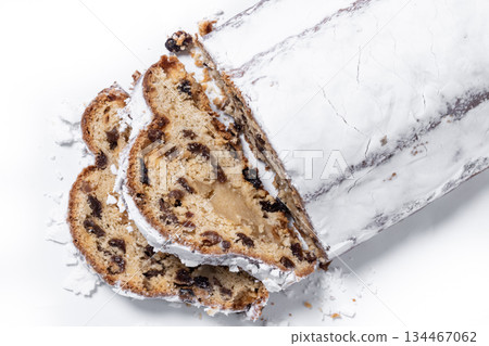 Traditional Christmas Stollen with Raisins and Powdered Sugar Traditional Christmas Stollen with Raisins and Powdered Sugar 134467062