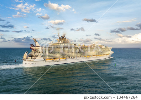 Aerial view of large cruise liner departing into Atlantic ocean from Miami port. Florida travel vacation concept 134467264
