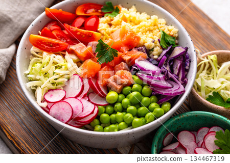 Balanced healthy bowl with vegetables and salmon Balanced healthy bowl with vegetables and salmon 134467319