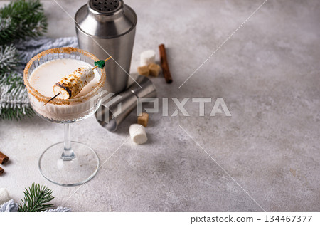 Christmas cocktail with toasted marshmellow Christmas cocktail with toasted marshmellow 134467377