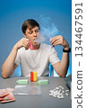 Vertical portrait of drug dealer sitting at desk with scattered cash, pharmaceuticals, smoking electronic heated tobacco device, exhaling vapor against blue background. 134467591
