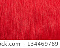 Artificial red fur coat macro photo as a background. 134469789