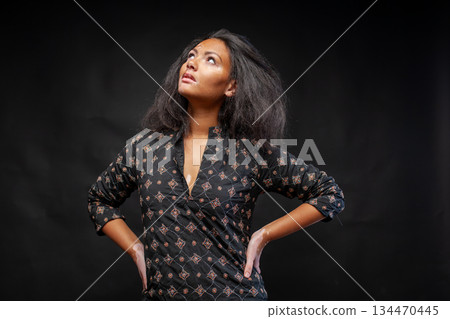 Young African woman with vitiligo wearing 134470445