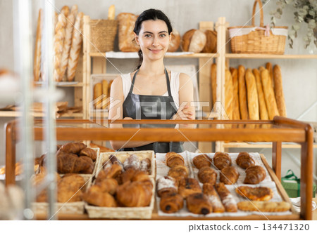 Armenian young woman work selling in family bakery shop 134471320