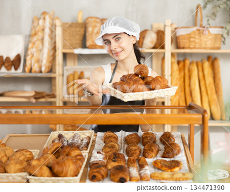 Armenian young woman work selling in family bakery shop Armenian young woman work selling in family bakery shop 134471390