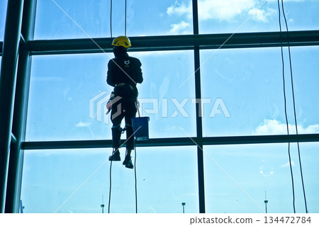extreme work cleaning windows at height extreme work cleaning windows at height 134472784