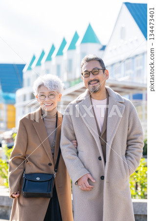 Senior couple traveling. Photo courtesy of Ito Marine Town Roadside Station. 134473401