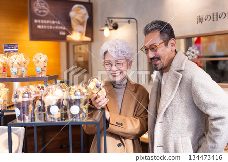 Senior couple shopping. Photo courtesy of Ito Marine Town Roadside Station. 134473416