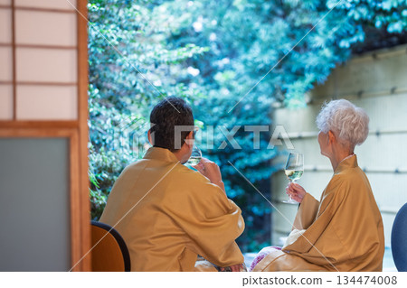 Senior couple drinking wine on the veranda. Photo courtesy of Ito Ryokuyo. Senior couple drinking wine on the veranda. Photo courtesy of Ito Ryokuyo. 134474008