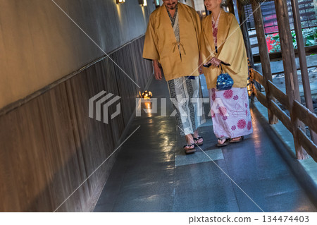 Senior couple enjoying a hot spring trip. Photo courtesy of Ito Ryokuyo. 134474403
