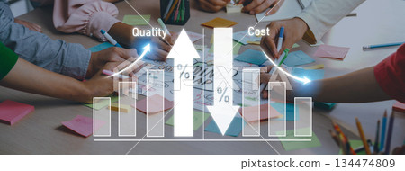 Collaborative Business Meeting Analyzing Quality and Cost Trends with Sticky Notes and Graphs on Table Surface Trope 134474809