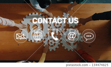 Collaborative Teamwork in Office with Hands Interacting with Gear Designs and Contact Us Symbols for Business Communication and Networking. Raster Collaborative Teamwork in Office with Hands Interacting with Gear Designs and Contact Us Symbols for Business Communication and Networking. Raster 134474825