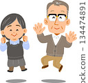 Senior couple jumping 134474891