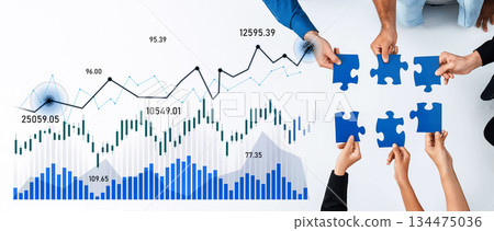 Team Collaboration on Business Strategy with Charts and Puzzles Representing Growth and Problem Solving in Modern Office Environment Scalp Team Collaboration on Business Strategy with Charts and Puzzles Representing Growth and Problem Solving in Modern Office Environment Scalp 134475036