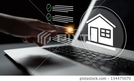 Digital interaction with real estate concept using laptop and hand, showcasing online property management, decision making, and technological advancement in housing Gantry Digital interaction with real estate concept using laptop and hand, showcasing online property management, decision making, and technological advancement in housing Gantry 134475070