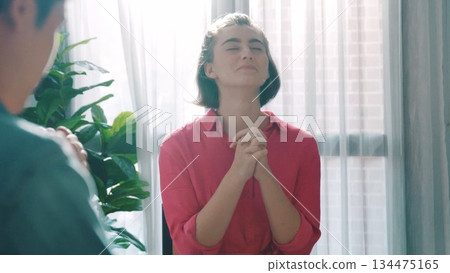 Top view of smart diverse prayer clasping hand and praying to god. Symposium. 134475165